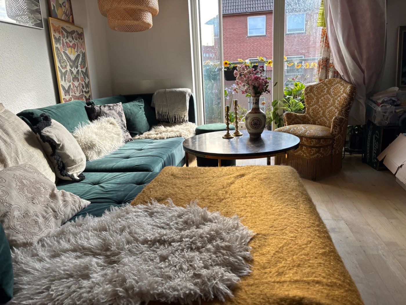 Living Room Interior featuring Green Velvet Sofa and Vintage Armchair